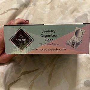 Brand new clear jewelry organizer case with mirror!